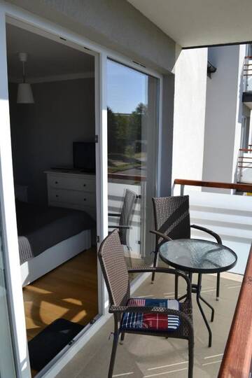 Фото номера Апартаменты с балконом Апартаменты Apartament Morski VI г. Дарлувко 19