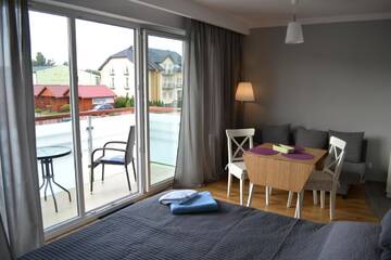 Фото номера Апартаменты с балконом Апартаменты Apartament Morski VI г. Дарлувко 25
